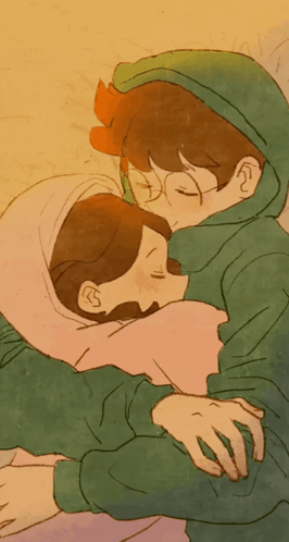 Two People Hugging One in Green Hoodie
