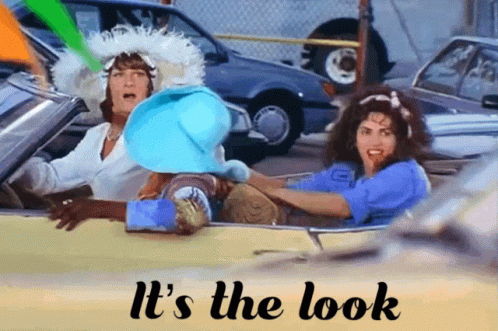 Two People In A Car With The Words It 'S The Look On The Bottom Right GIF