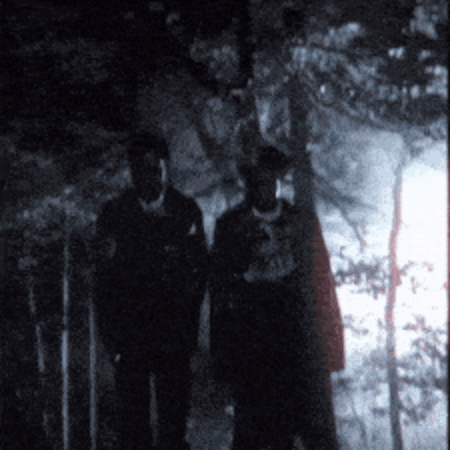 Two People in Dark, One Shirt Saying A