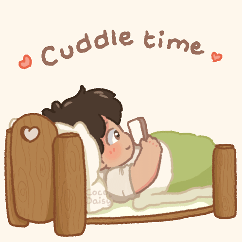 Two People Laying in Bed Cuddle Time