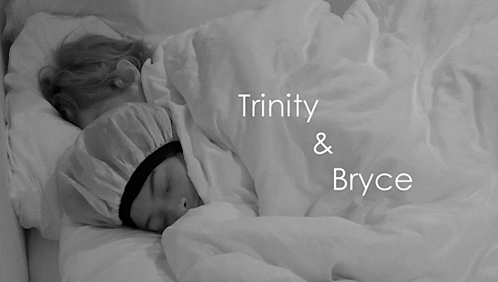 Two People Sleeping Under Blanket Saying Trinity And Bryce GIF