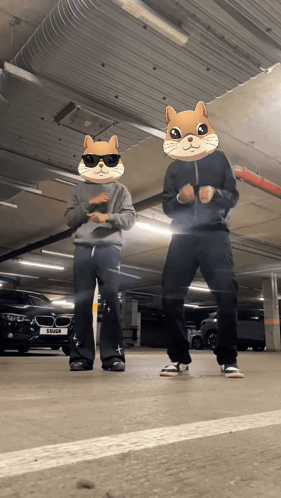 Two People Wearing Hamster Masks Are Dancing In A Garage GIF
