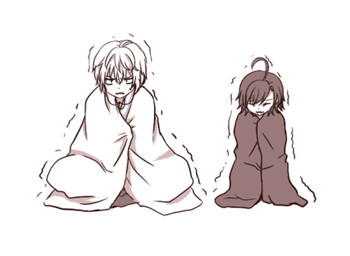 Two People Wrapped in Blankets