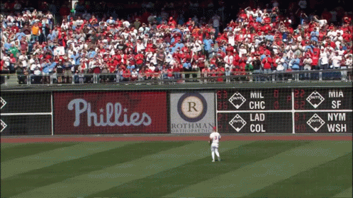 Two Phillies Baseball Players in Dugout