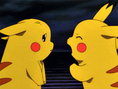 Two Pikachu Standing Together One Making Funny Face