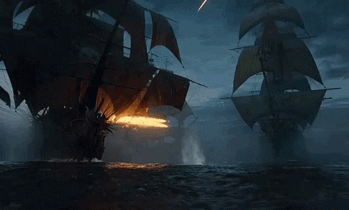 Two Pirate Ships Fighting at Night