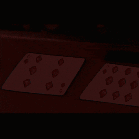 Two Playing Cards on Table