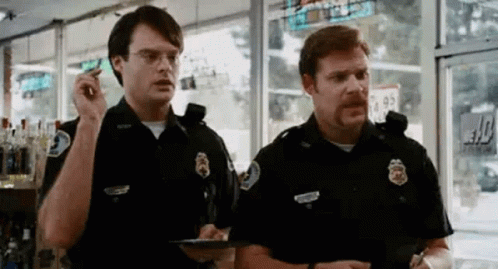 Two Police Officers Talking in Store