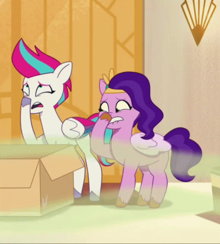 Two Ponies One Wearing Crown