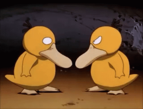 Two Psyduck Taking Turns Slapping GIF
