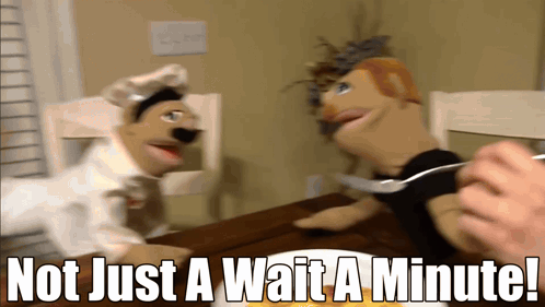 Two Puppets Are Sitting At A Table With The Words " Not Just A Wait A Minute " Below Them GIF