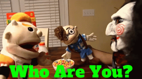 Two Puppets Saying Who Are You