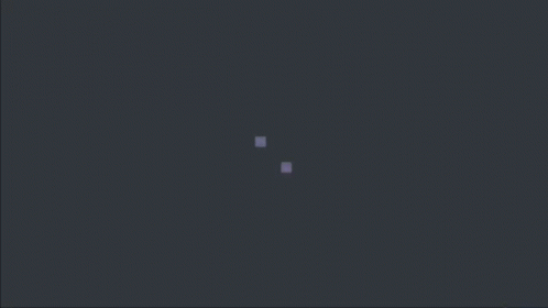 Two Purple Squares Are Floating In The Dark On A Dark Background . GIF