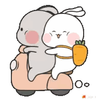 two rabbits are riding a scooter and one is holding a carrot in its mouth .