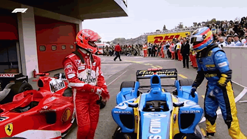 Two Race Car Drivers Side by Side