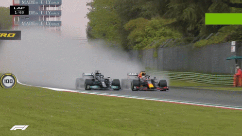 Two Race Cars on Track With Number 100