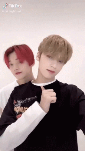 Two Red-Haired Boys Posing GIF