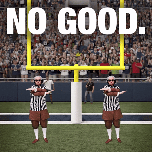 two referees are standing in front of a goal post with the words " no good " above them