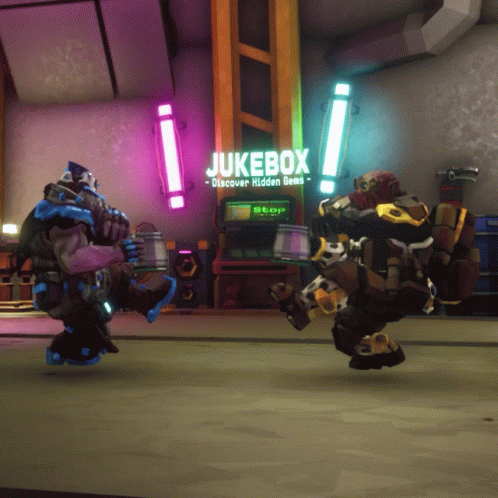 Two Robots Are Dancing In Front Of A Jukebox That Says " Discover Hidden Gems " GIF