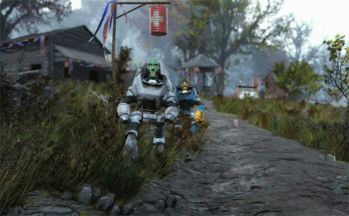 Two Robots Are Walking Down A Dirt Road With A Red Lantern In The Background GIF