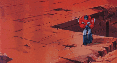 Two Robots Standing on Red Background