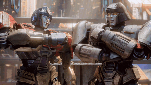 Two Robots Standing Together With Letter O