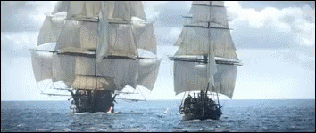 Two Sailboats Sailing in Ocean With Cloudy Sky