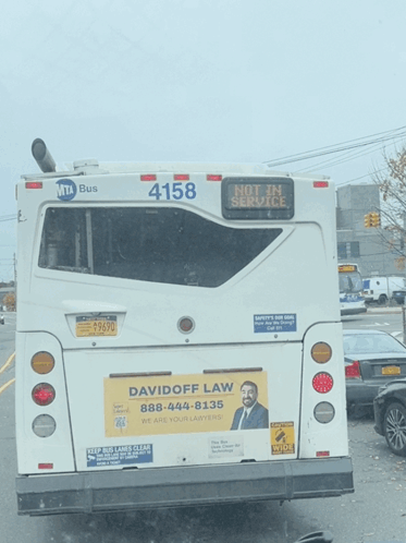 Two School Buses Parked Together With Foundation Logo