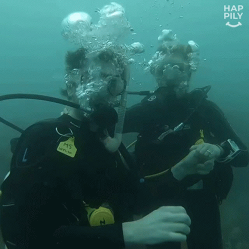 Two Scuba Divers Hap pily