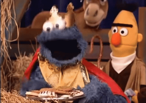 Two Sesame Street Characters Are In A Nativity Scene GIF