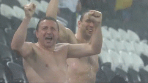 Two Shirtless Men Are Cheering With The Words Rain Delay Written On The Bottom GIF