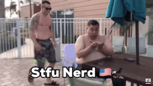 Two Shirtless Men Are Sitting At A Table With The Words Stfu Nerd Written On The Bottom GIF