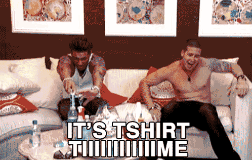 Two Shirtless Men Sit On A Couch With The Words It 'S Tshirt Time Written On The Bottom GIF