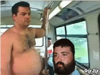 Two Shirtless Men Standing On Bus GIF