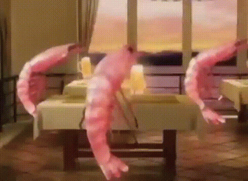 Two Shrimp Hanging from Restaurant Window