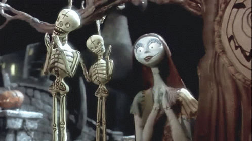 Two Skeletons One With Cross
