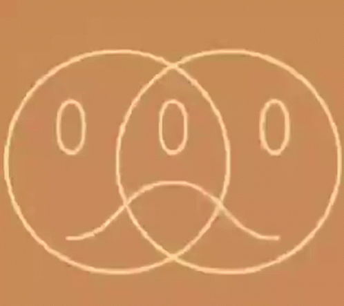 Two Smiley Face Circles on Brown Background