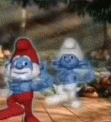 Two Smurfs Are Dancing On A Wooden Floor . GIF