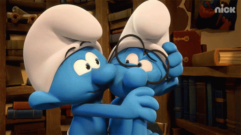 Two Smurfs Wearing Glasses Are Hugging Each Other With A Nick Logo In The Corner GIF