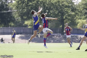 Two Soccer Players Are Jumping In The Air While One Has The Number 3 On His Jersey GIF