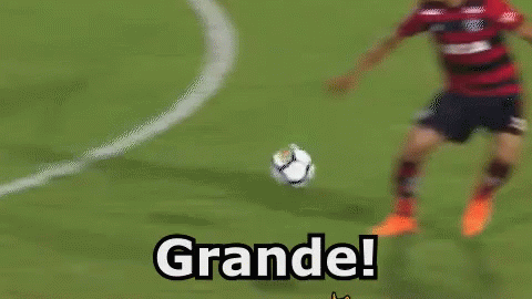 two soccer players are playing a game and one of them is wearing a shirt that says caixa on it .