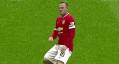 Two Soccer Players Are Playing A Game On A Field . GIF