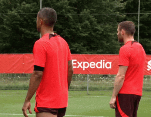 Two Soccer Players by Expedia Sign