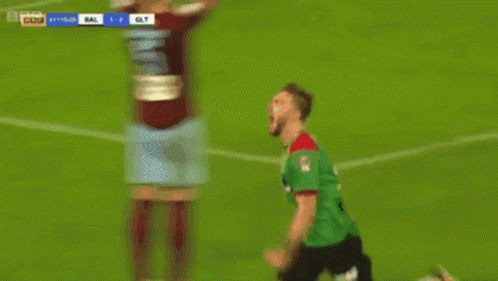 Two Soccer Players Celebrating a Goal