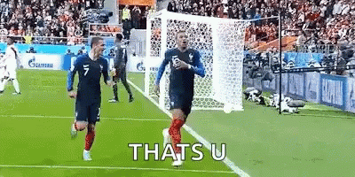 Two Soccer Players Celebrating Goal Saying That's U GIF