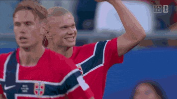 Two Soccer Players Celebrating Goal With Dazn Logo