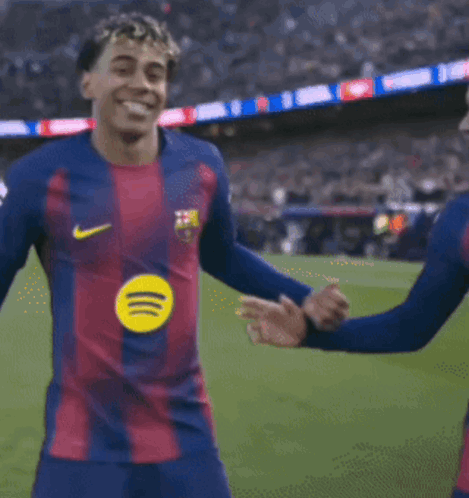 Two Soccer Players Dancing in Nike Jerseys