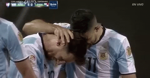 Two Soccer Players Hugging Argentina vs Panama