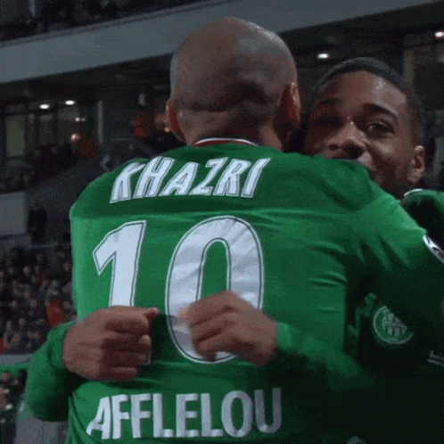 Two Soccer Players Hugging Number 10 GIF