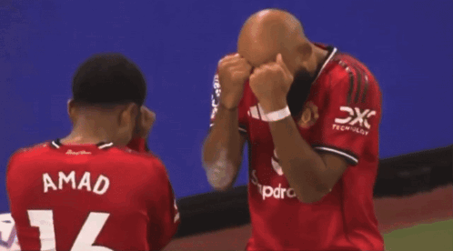 Two Soccer Players Hugging Number 16 GIF